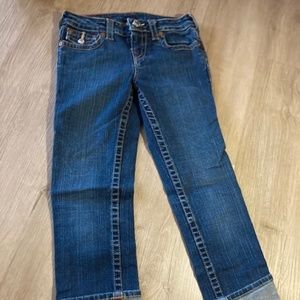 Girls, True Religion jeans.